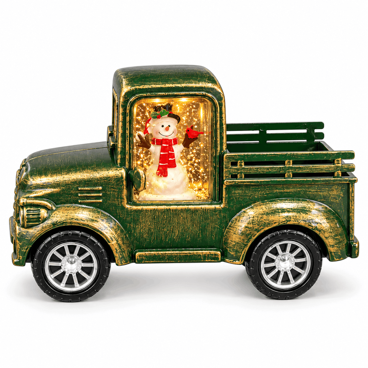 Weihnachtliche Retro-Dekoration: kleiner grüner Truck mit beleuchteter Szene und Schneemann